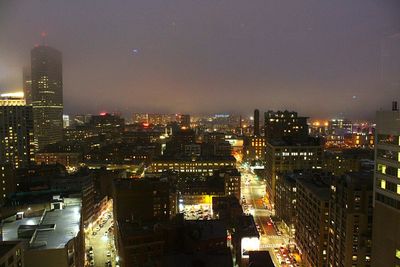 Illuminated cityscape at night