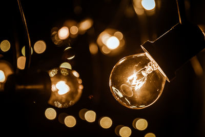 Close-up of illuminated light bulb