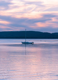 Scenic view of sea against sky at sunset