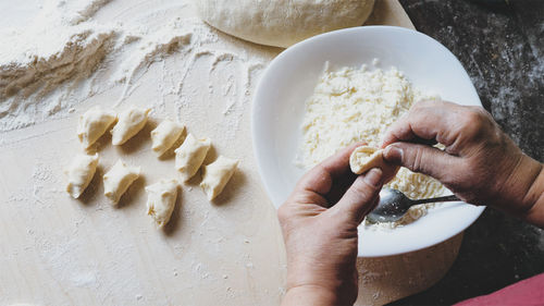 High angle view of person preparing food