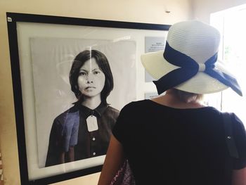 Close-up of young woman standing in store