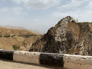 Scenic view of rocky mountains against sky
