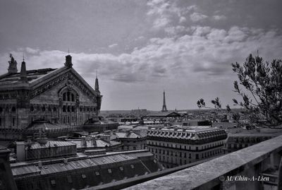 Panoramic view of buildings in city against sky