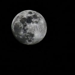 Scenic view of moon against sky at night