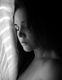 Close-up of woman looking away