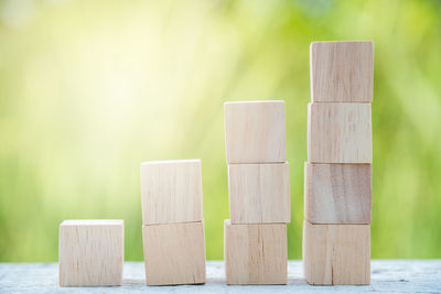 Close-up of wooden blocks arranged on table