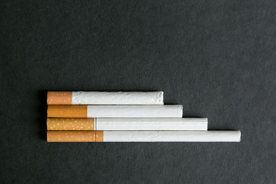 Close-up of cigarettes on table