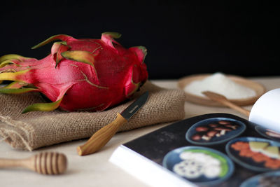 Close-up of dragon fruit on table