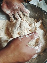 Close-up of person preparing food