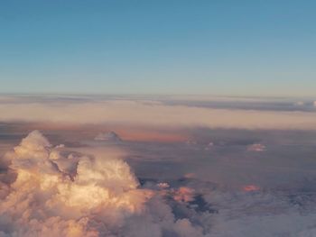 Aerial view of cloudscape against sky during sunset