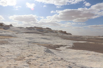 Scenic view of beach against sky