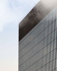 Low angle view of modern building against sky