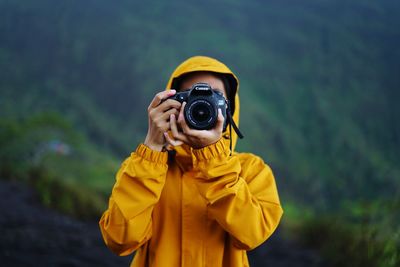 Man photographing with camera