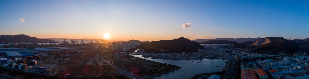 High angle view of cityscape against sky during sunset