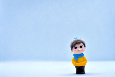 Close-up of stuffed toy against white background