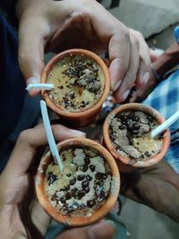 High angle view of hand holding food