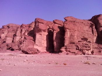 Rock formations against clear sky