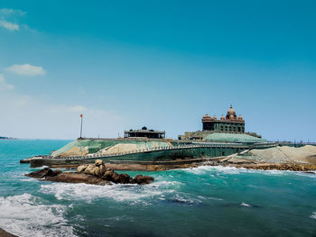 Scenic view of sea against blue sky