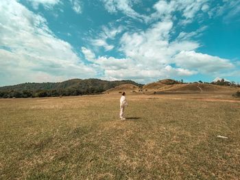 Woman standing on land