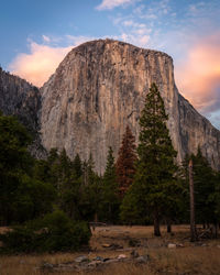 Rock formations on mountain against sky