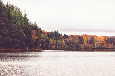 Scenic view of lake against sky during autumn