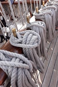 Close-up of rope tied on wood