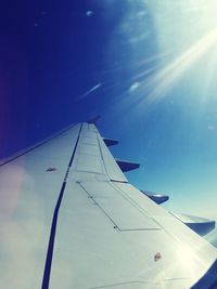 Low angle view of vapor trails in sky