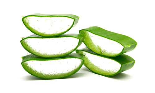 Close-up of lemon against white background