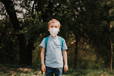 Full length of a boy standing on land