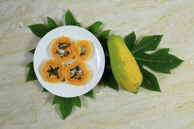 High angle view of fruit salad in plate on table