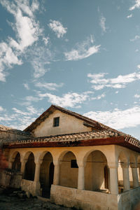Low angle view of old building against sky
