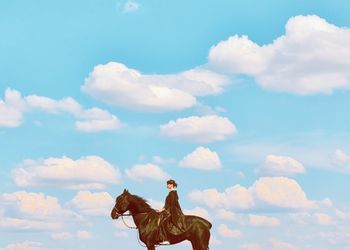 Low angle view of horse against sky