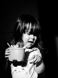 Portrait of a girl in drinking glass