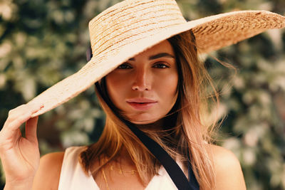 Portrait of woman wearing hat