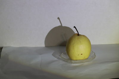 Close-up of apple on table