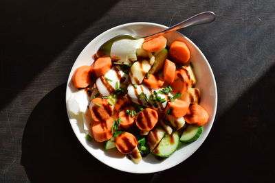 High angle view of salad in bowl on table