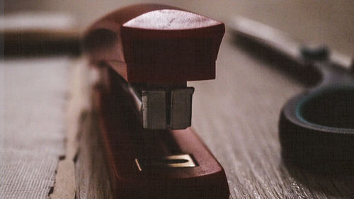 Close-up of guitar on table