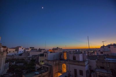 View of buildings against clear sky