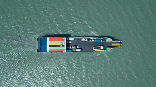 High angle view of ship floating on sea