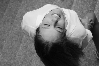 High angle view of smiling young woman