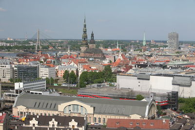 Vansu bridge and churches in city against sky