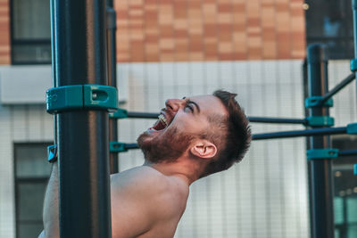 Portrait of shirtless young man