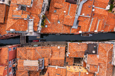 Beautiful orange roofs of venice in italy. aerial view.