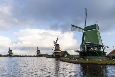 Traditional windmill against sky