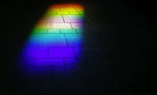 High angle view of illuminated lights on tiled floor