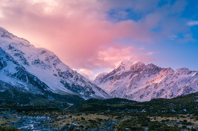 Winter mountain landscape with colorful clouds at sunset. snow covered mountains nature landscape