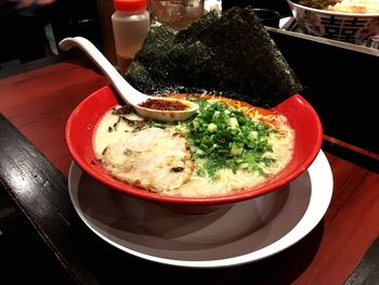 Close-up of soup served on table