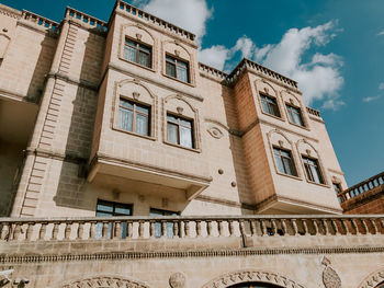 Low angle view of old building against sky