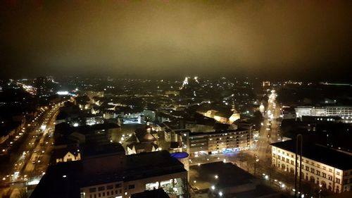 Illuminated cityscape at night