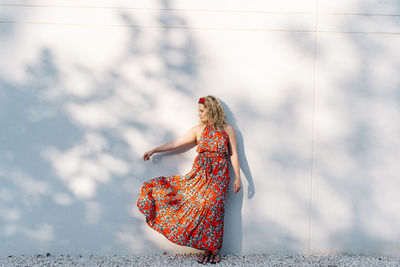 Low section of woman standing outdoors